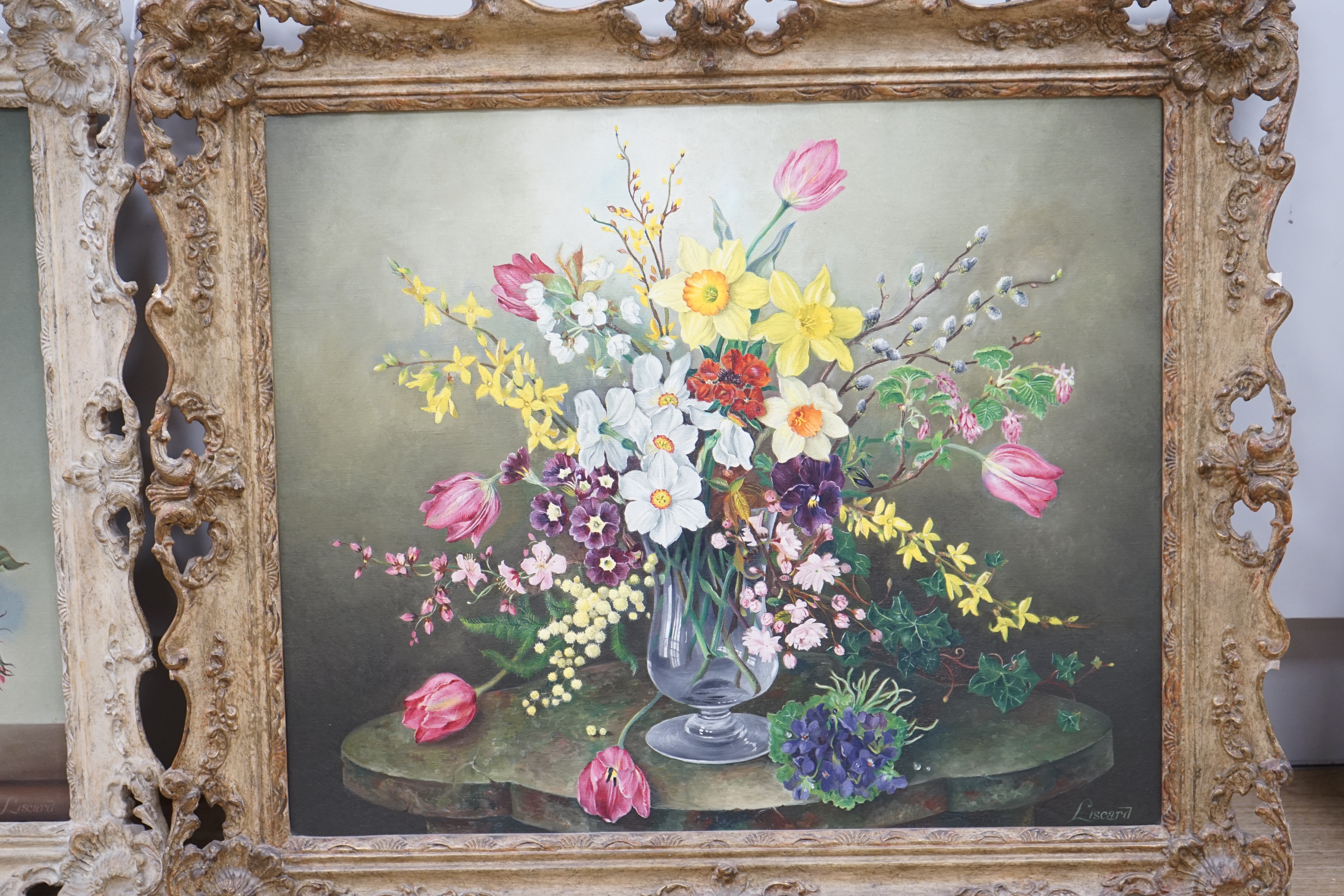 Eustace Liscard (20th. C), two oils on canvas, Still lifes of flowers comprising ‘Lovely is the rose’ and one other, each signed, largest 49 x 59cm. Condition - good, some losses to the frames